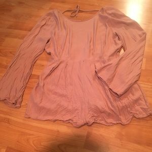 Blush pink romper with open back